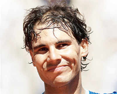 Nadal battles wardrobe malfunction in Monte Carlo