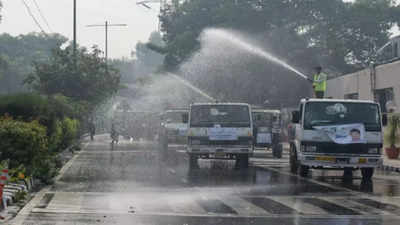 Delhi pollution updates: Fire service starts sprinkling water at 13 hotspots