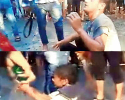 Cops detain two after video of them thrashing minors goes viral