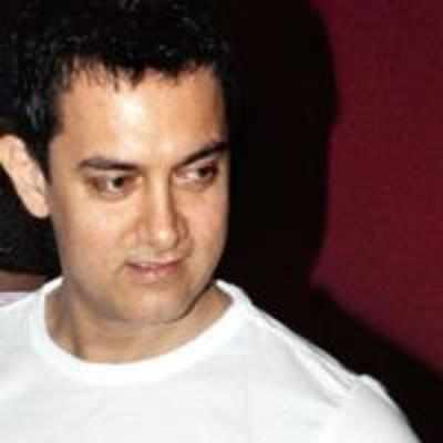 Aamir can't do Dhoom before July