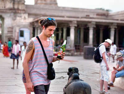 Tourist has liquor inside Hampi temple, triggers huge protests