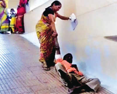 Denied stretcher, wife drags man to doctor on 1st floor