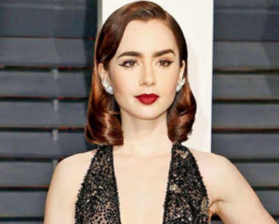 Lily Collins loves taking chances with red carpet