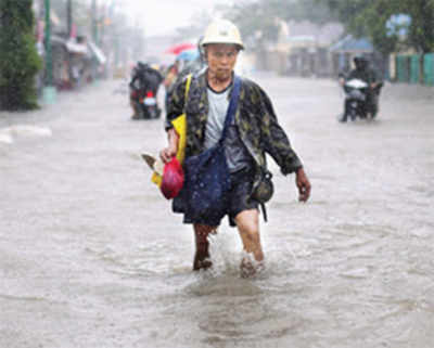 Storm heads for Philippine capital after killing 27