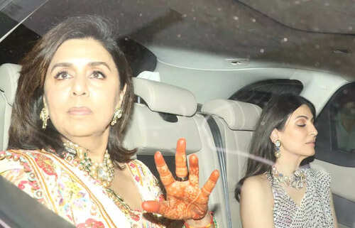Neetu Kapoor shows off her mehendi design as she leaves with daughter Riddhima post attending Ranbir Kapoor-Alia Bhatt's pre-wedding festivities