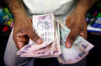 Rupee drops to an all-time low of 62 per dollar