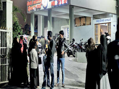 Bengaluru riots: Women gather outside stations