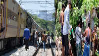 Bihar shramik special: Migrant workers rush to get water from nearby houses at Vizag station 