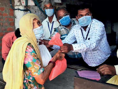 Collector rushes food to hungry slum-dwellers