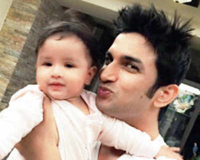 Sushant turns baby-sitter for the Dhonis