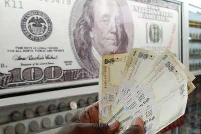 Rupee slips from early gains, down 5 paise against USD