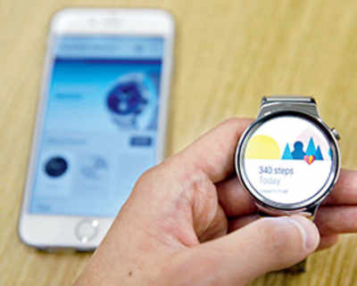 Google brings Android smart watch tech to iOS