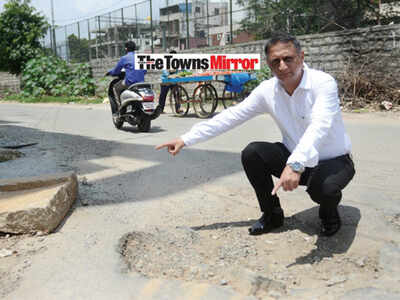 The Towns Mirror Special: Potholes make this a hell hole