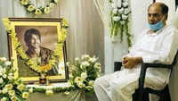 Sad pic! Sushant's father sitting next to his frame 