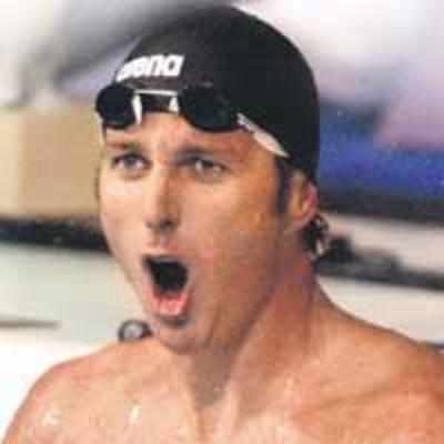 Peirsol world record overshadows Phelps debut