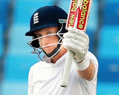 Root stands firm as England fight