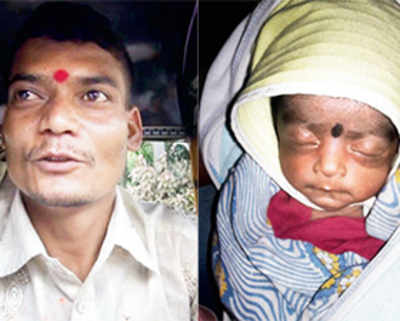 Driver finds 8-day-old girl in his auto