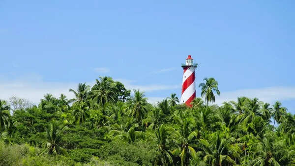 The old INR 20 note has a picture of a real island you can visit in India. Can you guess which place it is?