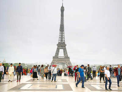 Eiffel Tower reopens to visitors after 104 days