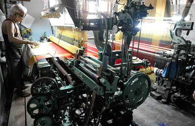 Power looms shed the noise