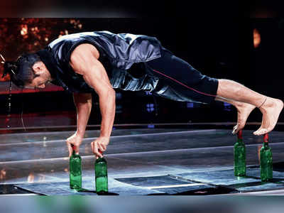Vidyut Jammwal balances on four bottles while performing a stunt on Sa Re Ga Ma Pa Li'l Champs