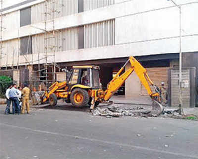 BMC demolishes illegal ramps outside sobo building