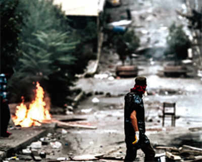 Syrian Kurds face shelling as Turkey battles Islamic state
