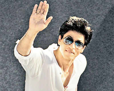 SRK showman out to woo the world