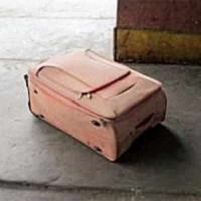 Woman's body found in abandoned bag at CST