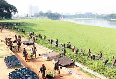 Soldiers from Madras Engineers Group remove water hyacinth from Ulsoor Lake
