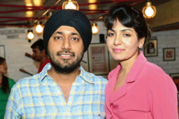 Youngsters try different delicacies at a food event in Ahmedabad