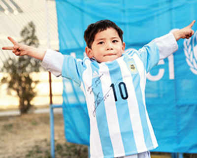 Afghan boy who wore Messi ‘bag shirt’ receives real signed shirt from Barca star