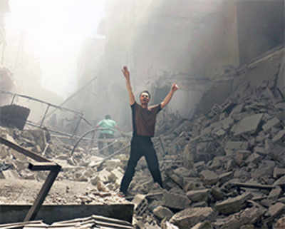 Shelling, airstrikes kill 60 in Syrian city Aleppo