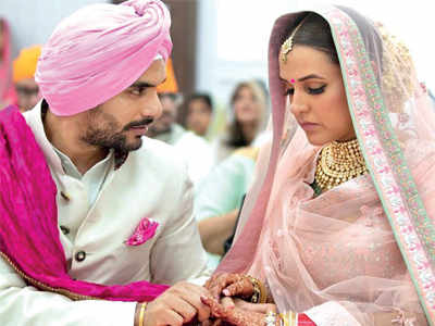 Angad Singh Bedi and Neha Dhupia tie the knot in a quiet ceremony in Delhi