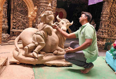 Long and short of clay Ganesha