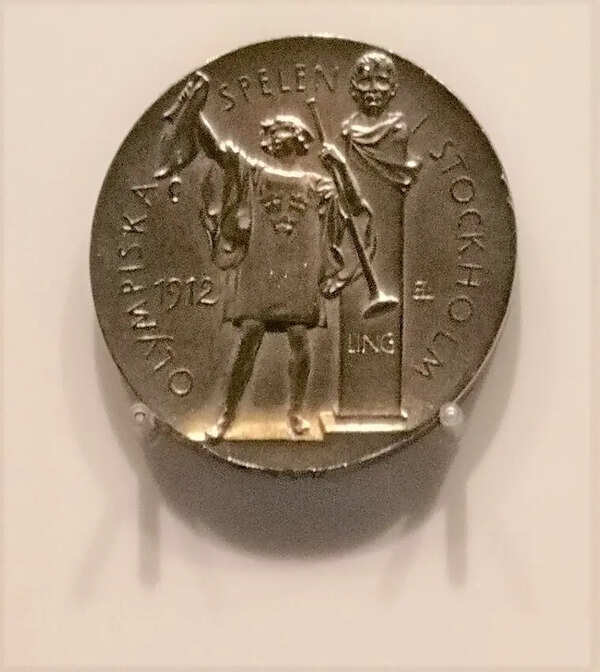 Olympic gold medals contain at least six grams of gold, while the rest is silver; the last solid-gold medals were awarded in 1912