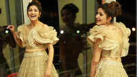 Haryanvi sensation Sapna Choudhary looks gorgeous in this golden coloured lehnga-choli! 