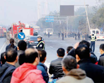 8 blasts outside Communist Party office in China, 1 dead
