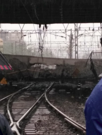 Mumbai rains: Part of FoB collapses between Ville Parle, Andheri; local train services on Western Line hit