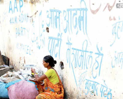 Kejriwal’s AAP shows it’s no different, defaces wall