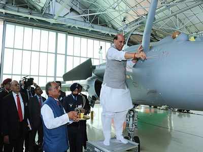 Defence Minister Rajnath Singh receives IAF's first Rafale fighter jet from France