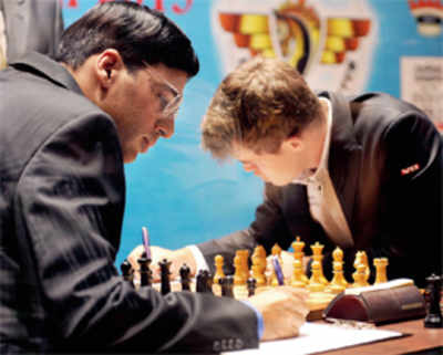 Anand hold off Carlsen