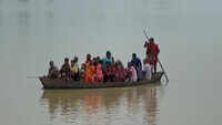 People use boats to commute after floodwater enters in parts of Bihar's Darbhanga 