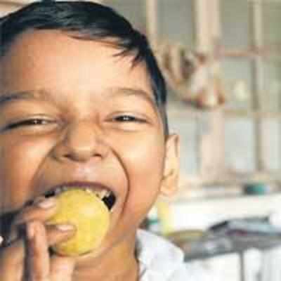 First mouthful of Diwali for this 8-yr-old