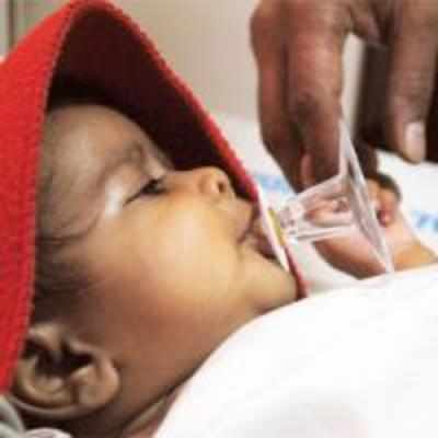 Foetus removed from 2-month-old baby's abdomen