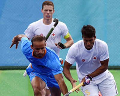 India held 2-2 after Canada's late goal