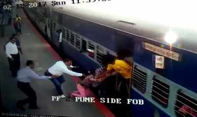 RPF officer saves girl from falling off moving train