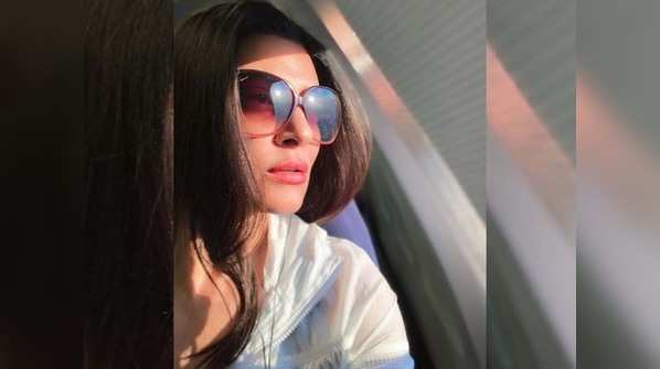 ​Sushmita Sen shares a sun-kissed picture as she faces the sun fearlessly