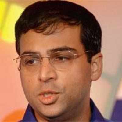 Anand in joint lead after beating Short