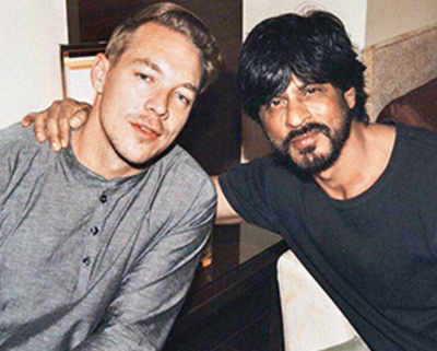 Grammy winner chills with SRK
